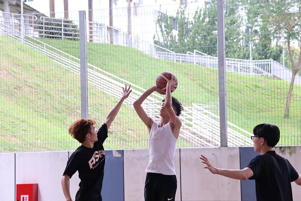 Students playing basketball